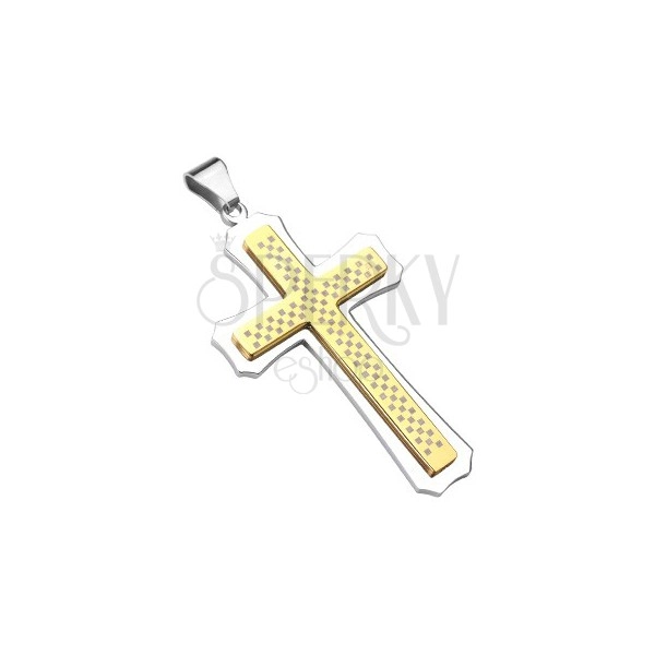 Mohutný kríž zlato-striebornej farby so šachovnicou