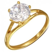 Oceľový prsteň zlatej farby, rozdvojené ramená a veľký trblietavý zirkón