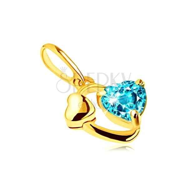 Zlatý prívesok 375 - kontúra oválu, lesklé srdiečko, srdce z modrého topásu