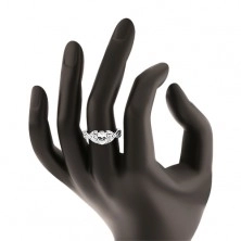 Žiarivý strieborný prsteň 925, prekrížené zvlnené ramená, oválny zirkón
