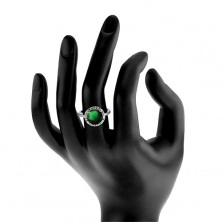 Prsteň zo striebra 925, okrúhly smaragdovozelený zirkón, číry zirkónový lem