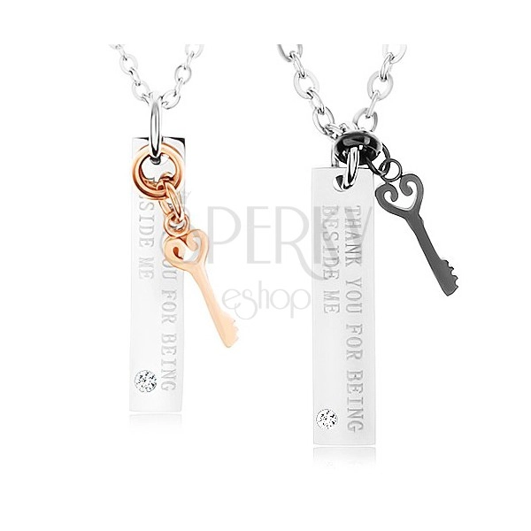 Dva oceľové náhrdelníky, ozdobné kľúče, známky - nápis, zirkón