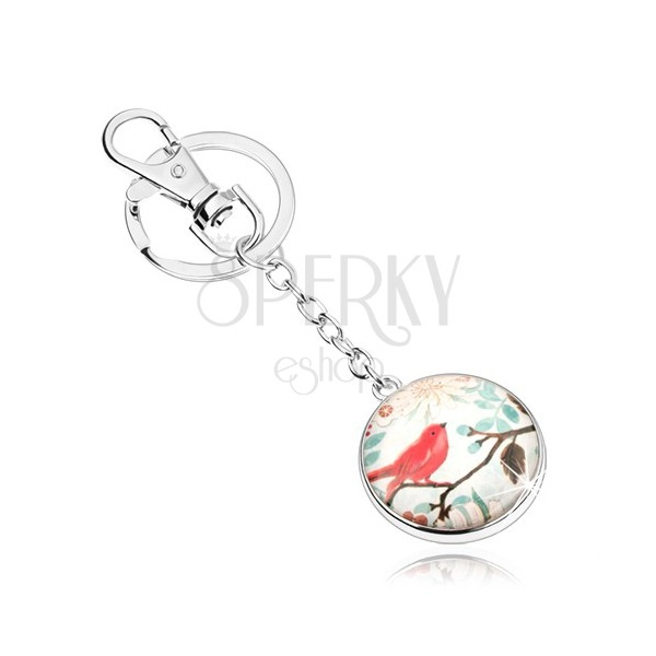 Cabochon kľúčenka, kruh so sklom, červený vtáčik na konári s lístkami, kvety