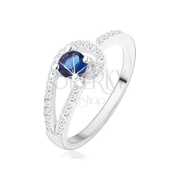 Strieborný prsteň 925, trblietavé línie čírej farby, okrúhly modrý zirkón