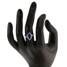 Strieborný 925 prsteň, ligotavý obrys zrnka, okrúhly modrý zirkón