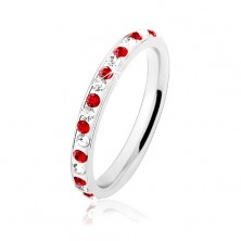 Oceľový prsteň striebornej farby, číre a červené zirkóniky, biela glazúra