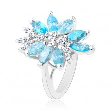 Ligotavý prsteň striebornej farby, veľký nesúmerný kvet z farebných zirkónov