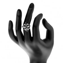 Ligotavý prsteň striebornej farby, čierno-číry zirkónový kvet, lesklé ramená