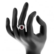 Lesklý prsteň s rozdelenými ramenami, veľký tmavočervený zirkón, číry lem