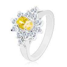 Ligotavý prsteň, oválny zirkón žltej farby, kontúra z čírych zirkónikov