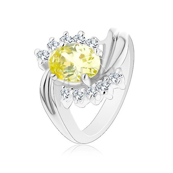 Lesklý prsteň so zvlnenými líniami ramien, oválny žltý zirkón, číre zirkónové oblúčiky
