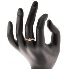 Zlatý prsteň 585 - prepletené rozdvojené ramená, číry zirkónový kvietok