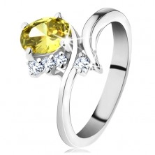 Trblietavý prsteň v striebornom odtieni, oválny zirkón v žltej farbe