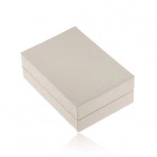 Biela koženková krabička na náušnice, lesklý povrch so zárezmi