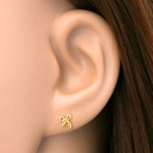 Piercing do ucha v žltom 14K zlate - lesklá uviazaná mašlička