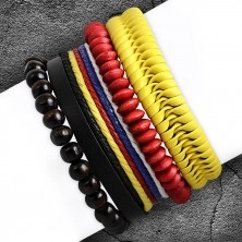 Sada štyroch náramkov - žltý pletenec, čierny pás so šnúrkami, hnedé a červené korálky