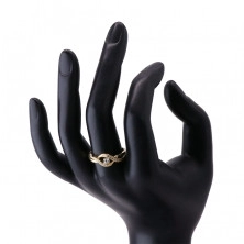 Zlatý prsteň zo 14K zlata - tenké prepletené ramená so zirkónikmi, okrúhly ligotavý zirkón 