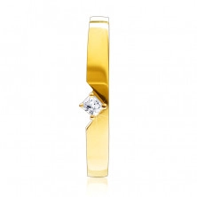 Zlatý prsteň zo 14K zlata - s výrezom a vystupujúcim štvorcovým zirkónom osadenom v štvorcípom kotlíku