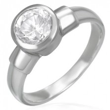 Oceľový snubný prsteň s veľkým zirkónovým očkom v kovovej objímke